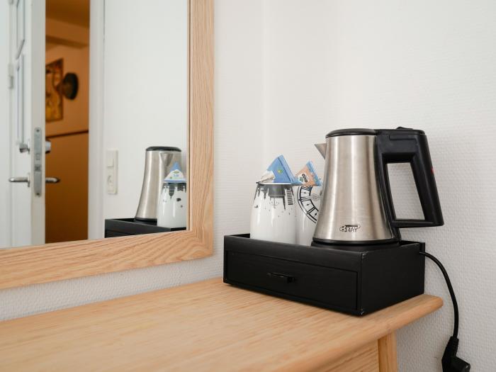 Photo of kettle and tea in the room